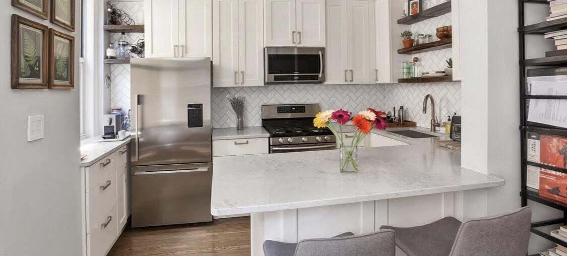 Need help! How can I make this look more homey without changing cabinets?