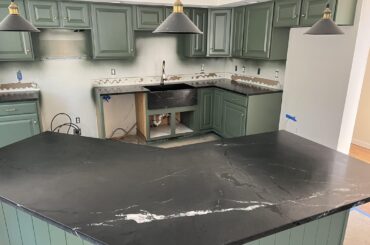 Cabinets and countertops are done!! Next up, appliances and plumbing