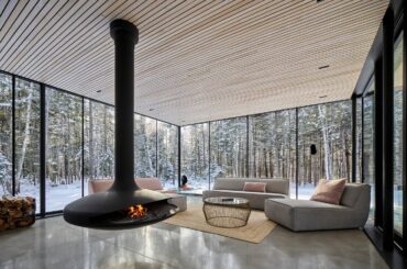 Glass walled living room in Apple Tree House [1418 x 1000] Montreal, Canada