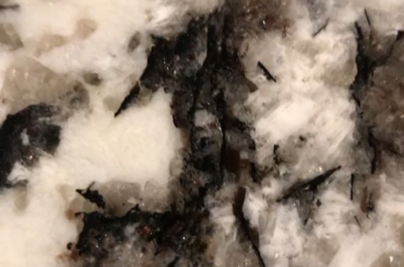 My granite counter top has a creepy face in it.