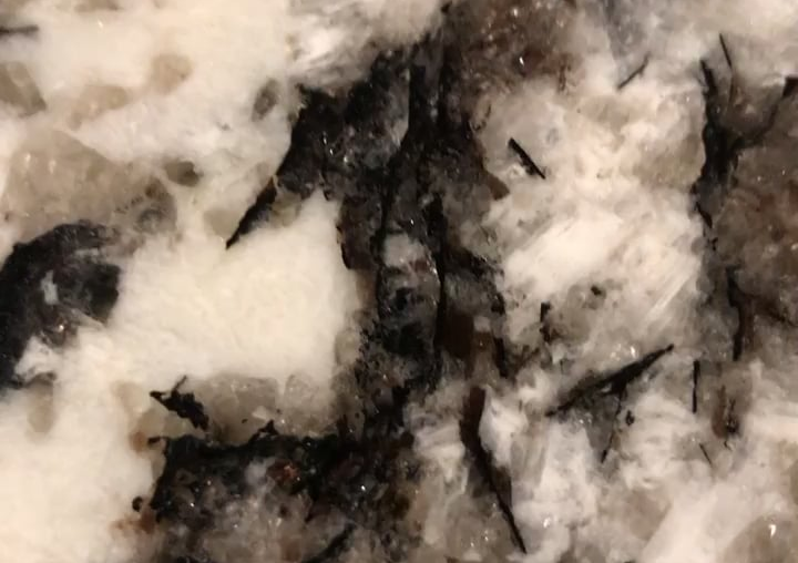 My granite counter top has a creepy face in it.