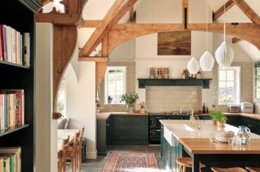 Spacious country kitchen with exposed beams and a breakfast nook in a Victorian home, Surrey Hills, Surrey, England [2000x2667]
