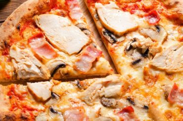 Putting These Canned Foods On Frozen Pizza Will Change Your Life