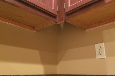 Any ideas on how to use this blind (non) cabinet space?