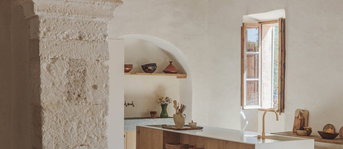Kitchen with exposed ceiling beams in a rural sandstone villa, village of Porreres in the Mediterranean island of Mallorca, Spain [2500x3748]