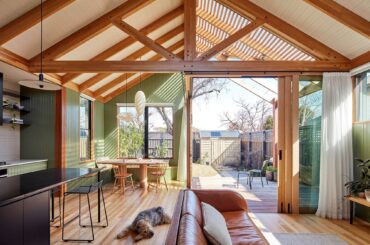 Kitchen and dining space in the timber extension to a weatherboard cottage in Northcote, Melbourne, Victoria, Australia [2000x1334]