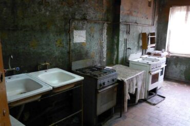 Bare kitchen in a Russian slum