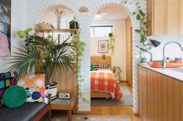 Brick archways in a small one-bedroom apartment, Fitzroy, Melbourne, Victoria, Australia [6250x4000]
