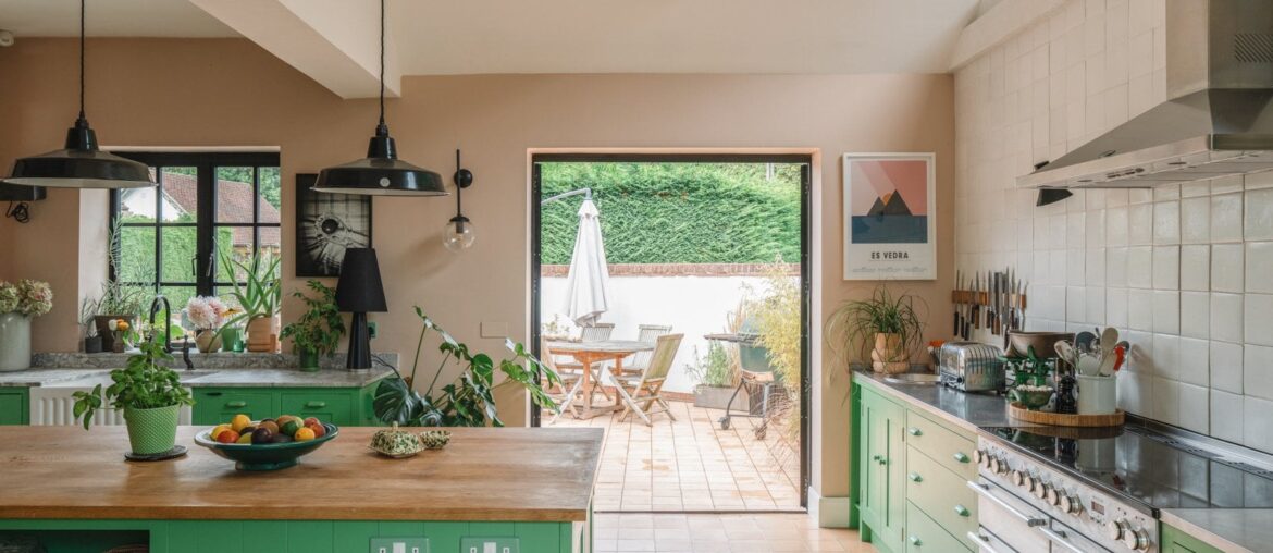 Kitchen opening up to the terrace in a renovated 18th-century farmhouse, Great Hallingbury, Uttlesford, Essex, England [1600x1066]
