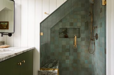 Attic bathroom with an angled tiled shower in a renovated Colonial house, Connecticut [2500x3717]