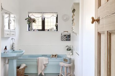 Formerly carpeted bathroom with a tall ceiling in a renovated four-bedroom house, Cambridgeshire, England [3024x4032]