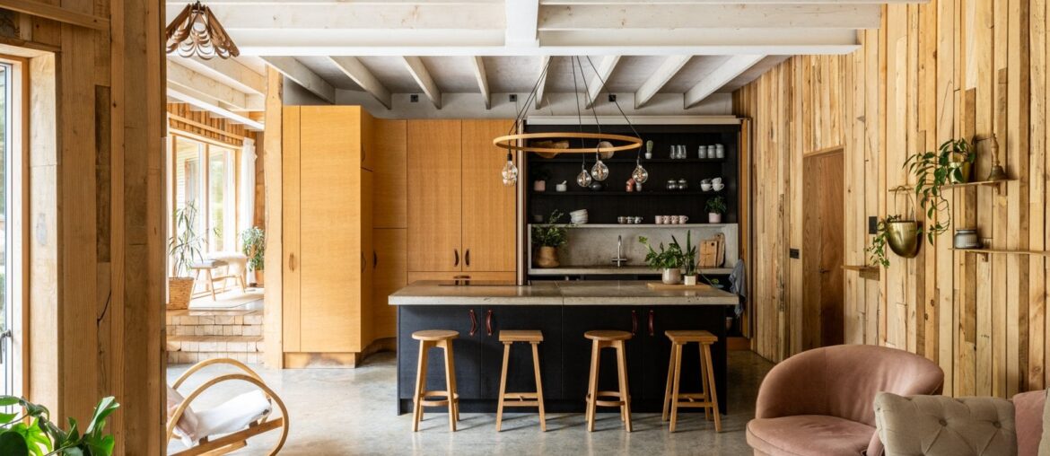 Timber-lined kitchen and living space in Helston, Cornwall, England [1600x1067]