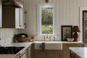 Sage green kitchen in a Toronto home, Ontario, Canada [2048x2560]