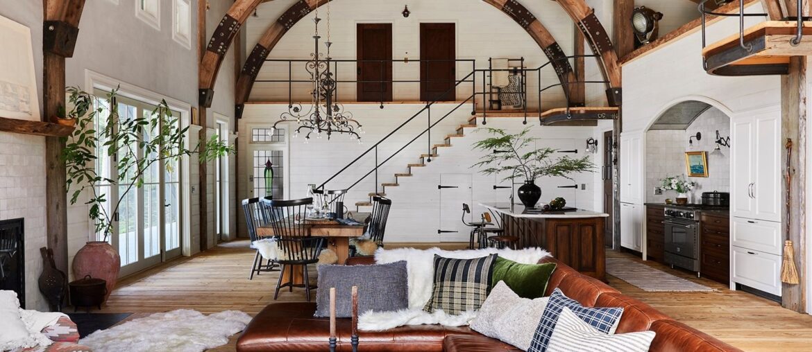 Spacious open plan living space with curved beams in a barn-inspired vacation home, Washington [1600x1200]