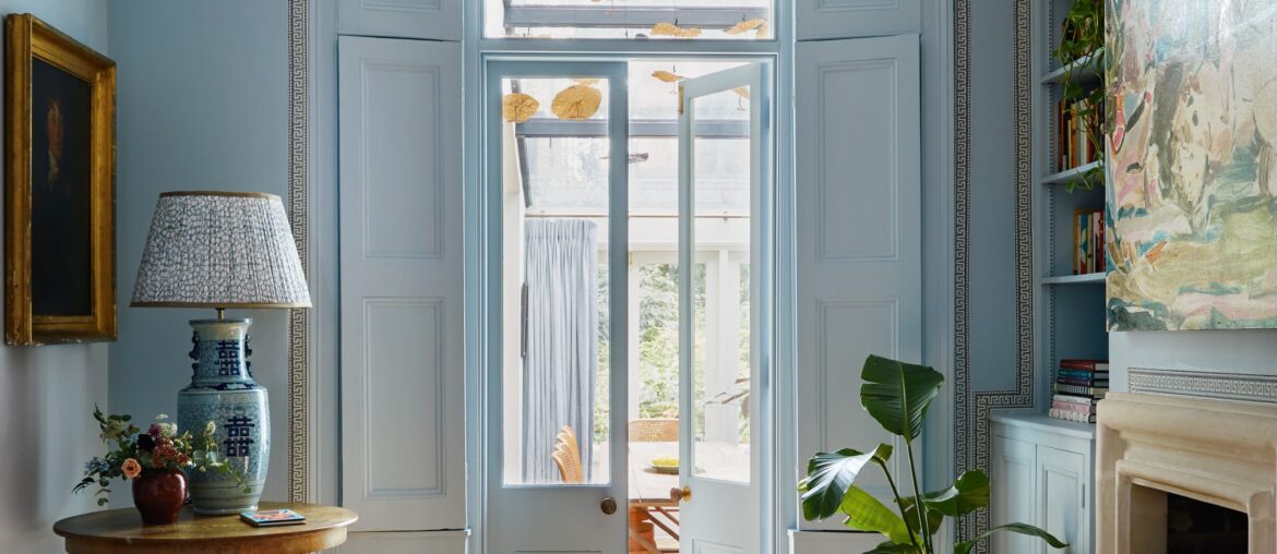 Pale blue antechamber with an antique daybed in a renovated Victorian terraced house, Dalston, East London, UK [3820x5000]