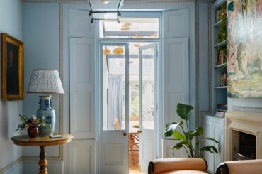Pale blue antechamber with an antique daybed in a renovated Victorian terraced house, Dalston, East London, UK [3820x5000]