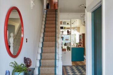 Entrance hallway in a colorfully renovated Victorian terraced house in East London, UK [1333x2000]