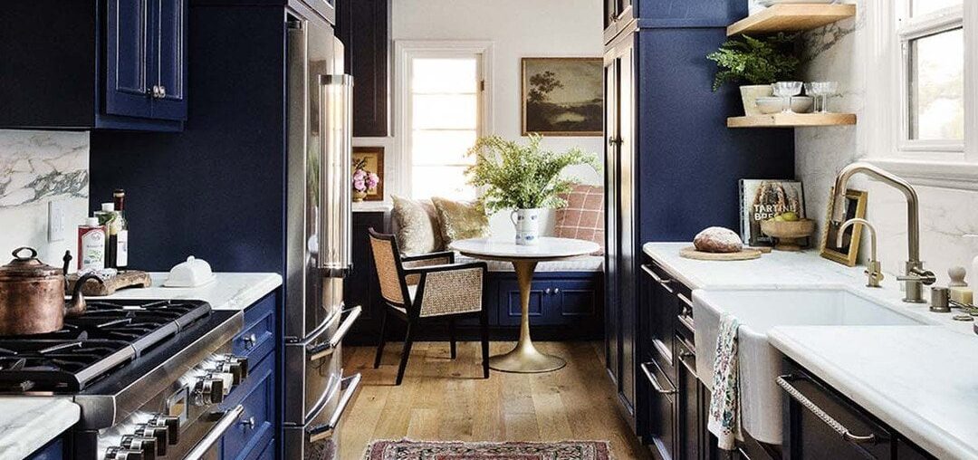 Galley kitchen with a breakfast nook in a gut-renovated circa-1932 Spanish Revival house, West Hollywood, Los Angeles County, California [1080x1350]
