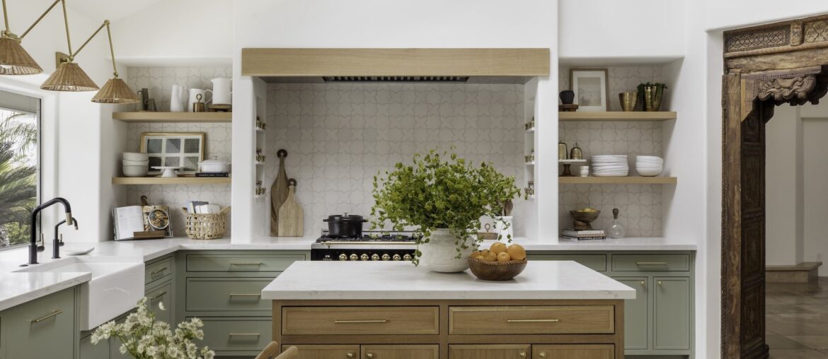 Bright and airy kitchen renovation with a carved wood entrance, Santa Barbara, California [2000x1333]