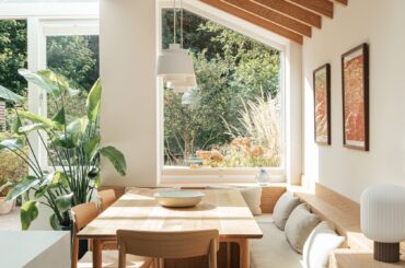 Kitchen and dining space extension with garden views added to a renovated Victorian terrace house in Barnes, South London, UK [1680x2520]
