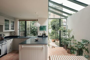 Greenhouse-like kitchen and dining space extension added to a Victorian house, Camberwell, South London, UK [1680x1119]