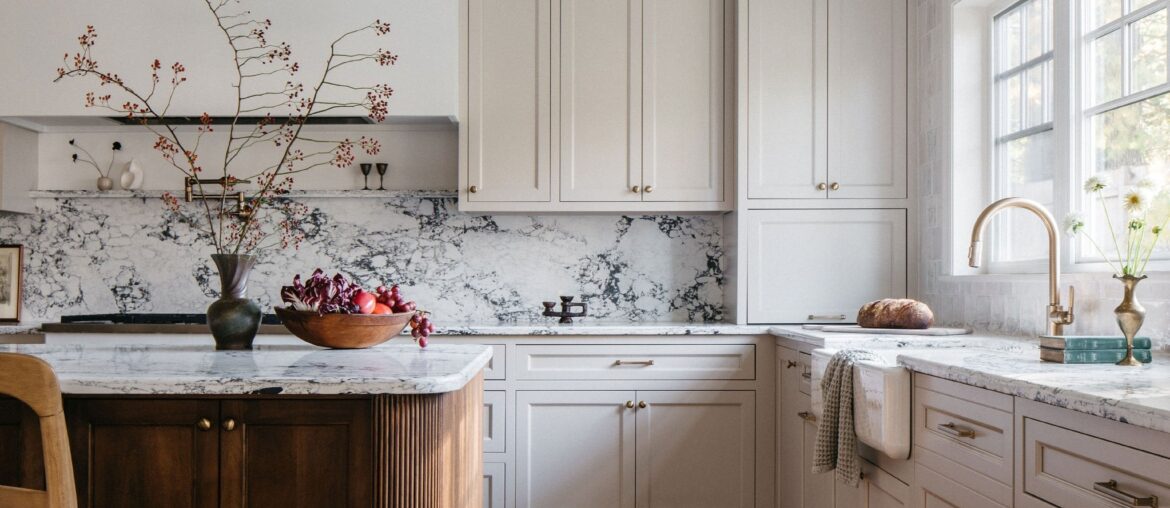 Kitchen with marble backsplash and reeded island in a new home, Clarendon Hills near Chicago, Illinois [2048x3072]