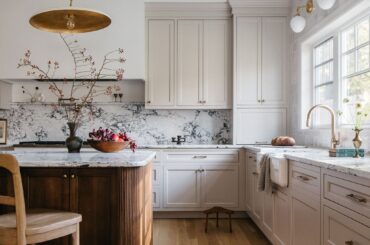 Kitchen with marble backsplash and reeded island in a new home, Clarendon Hills near Chicago, Illinois [2048x3072]
