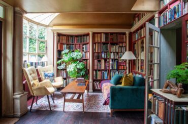 Home library with garden views in a three-bedroom 18th-century Georgian terrace house chock-full of books, Bristol, England [1600x1067]