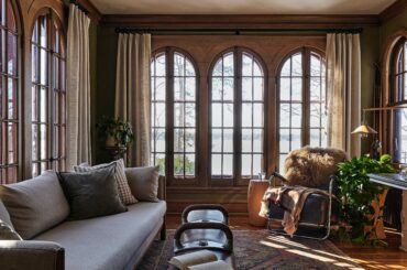 Restored and renovated 1935 Tudor Revival residence on Medicine Lake with well-preserved woodwork, including vaulted timber ceilings and arched windows and doorways, located in Plymouth near Minneapolis, Minnesota [5007x6259]