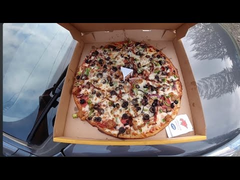 Garlic Jim’s Famous Gourmet Pizza (Video in French) Garlic Jim's Famous Gourmet Pizza (Video in French)