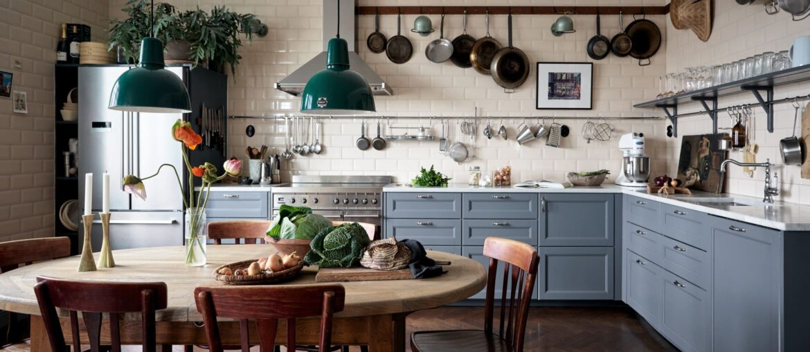 Spacious kitchen with herringbone floors in a renovated 1900s three-bedroom apartment, Liljeholmen, suburban Stockholm, Sweden [2200x1572]