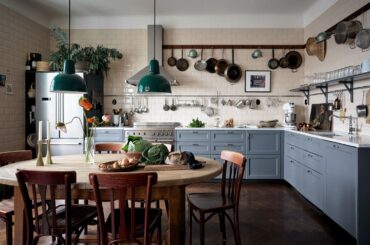 Spacious kitchen with herringbone floors in a renovated 1900s three-bedroom apartment, Liljeholmen, suburban Stockholm, Sweden [2200x1572]