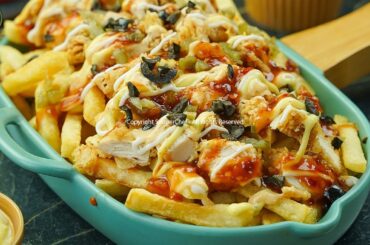 Gourmet Comfort Food: Whip Up a Batch of Chicken Loaded Fries with Delectable Cheese Sauce