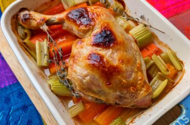 Chicken thigh with carrots and celery