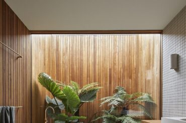 Bathroom with a view of the small internal courtyard garden lined with timber, Torquay, Surf Coast Shire, Victoria, Australia [1000x1500]