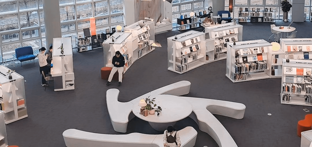 Spacious and modern library with large windows and ample seating areas, Uijeongbu Music Art Library, South Korea [1080 × 1350]