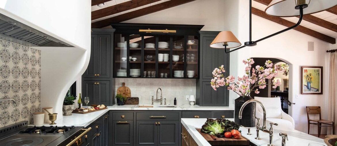 Wood-beamed vaulted ceiling kitchen with terracotta tile floors in a Spanish-style house, Carmel, Monterey County, California [1440x960]