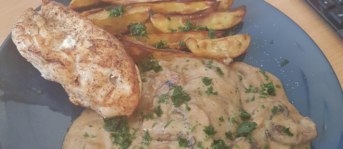 grilled chicken breast, mushroom sauce and potato wedges
