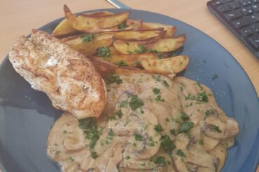 grilled chicken breast, mushroom sauce and potato wedges