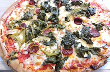 Galician style pizza with San Simón Da Costa cheese, chorizo and rapini