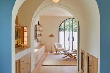 Arched hallway with a wet bar in a modern Santa Monica Canyon residence with Spanish inspiration, Santa Monica, California [1600x2403]