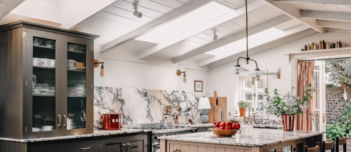 Kitchen with Calacatta marble worktop and backsplash in a renovated Victorian house, West Sussex, South East England [2515x3300]