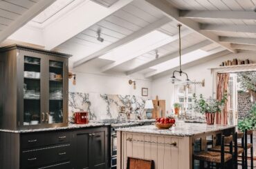 Kitchen with Calacatta marble worktop and backsplash in a renovated Victorian house, West Sussex, South East England [2515x3300]