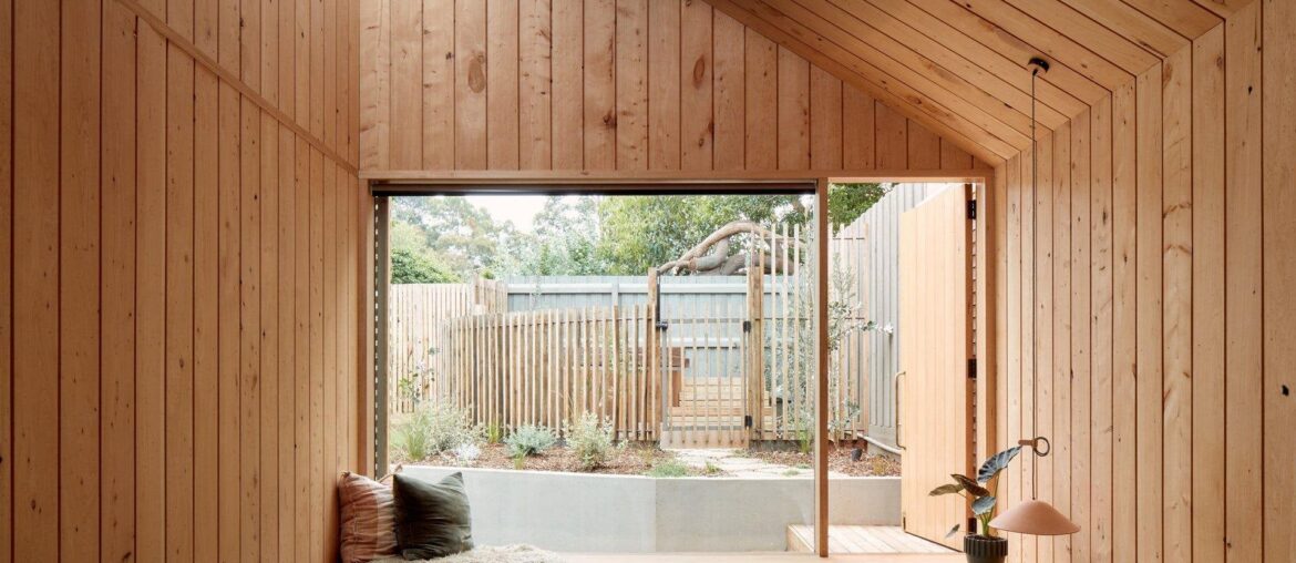 Timber-lined bedroom with a skylight opening up to the garden, Mornington Peninsula south of Melbourne, Victoria, Australia [1920x1628]