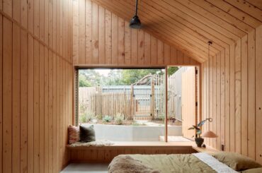 Timber-lined bedroom with a skylight opening up to the garden, Mornington Peninsula south of Melbourne, Victoria, Australia [1920x1628]