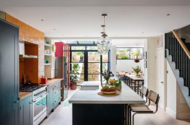 Basement kitchen and dining space opening up to the garden in a renovated Victorian house, Peckham, south London, UK [5760x3840]