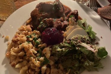 Gulasch, Spätzle, and Salad