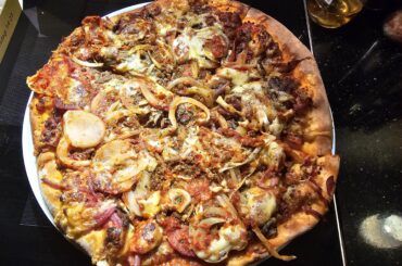 Home made pizza with a bit too much of everything!