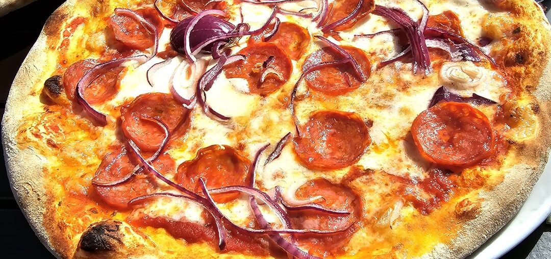 Pizza Siciliana (here: salami, onions, tomatoes, mozzarella, basil), served in the harbour of Constance, Germany ― which pizza for you? (Menu on pic 3)