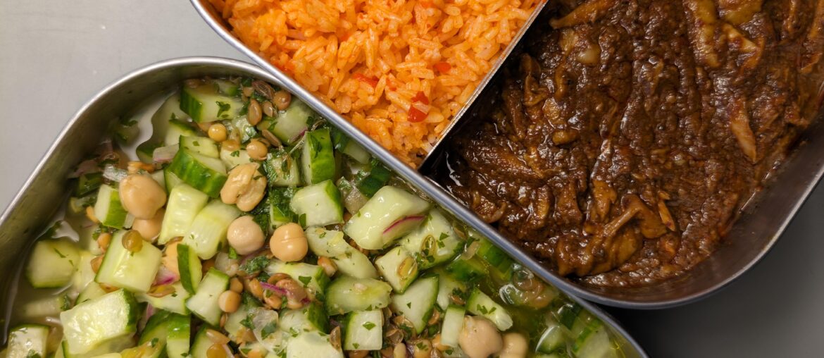 Chicken with mole, red rice and salad (brown lentils, chickpeas, red onions, evoo, parsley and vinegar)